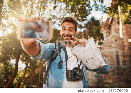 Tourist, happy man and peace sign selfie outdoor in a city for travel holiday with memory, smile and happiness. Male person with hand emoji for adventure, journey or vacation photo and freedom 135176600