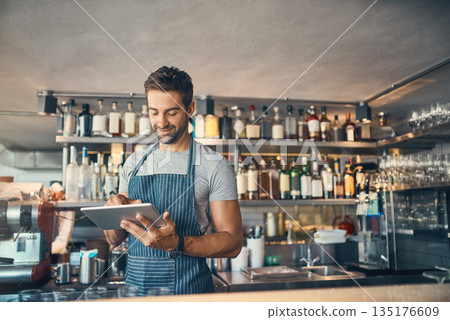 Man in restaurant, tablet and small business with inventory check, entrepreneur in hospitality industry and connectivity. Male owner, scroll and cafe franchise with digital admin and stock taking Man in restaurant, tablet and small business with inventory check, entrepreneur in hospitality industry and connectivity. Male owner, scroll and cafe franchise with digital admin and stock taking 135176609