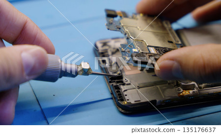 Close up of smartphone repair process 135176637