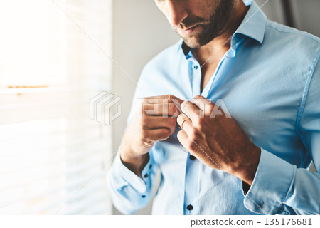 Hands, man and button shirt of clothes for job interview, work event and corporate fashion for business. Closeup, male person and ready in professional outfit from wardrobe in the morning at home Hands, man and button shirt of clothes for job interview, work event and corporate fashion for business. Closeup, male person and ready in professional outfit from wardrobe in the morning at home 135176681