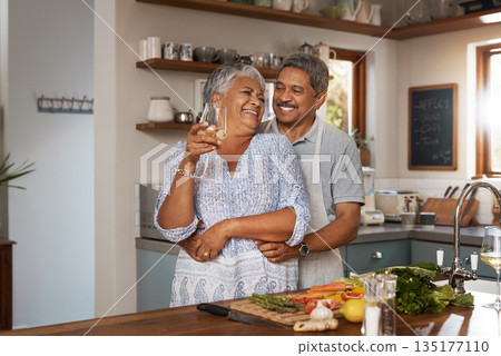 Happiness, hug and old couple at kitchen counter with wine, food and cooking healthy dinner together. Smile, embrace and love, senior man and happy woman in retirement with drinks, vegetables and fun Happiness, hug and old couple at kitchen counter with wine, food and cooking healthy dinner together. Smile, embrace and love, senior man and happy woman in retirement with drinks, vegetables and fun 135177110