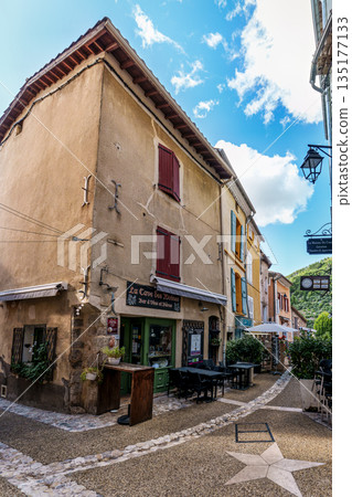 The narrow streets of the old village Moustiers Sainte Marie in The narrow streets of the old village Moustiers Sainte Marie in 135177133