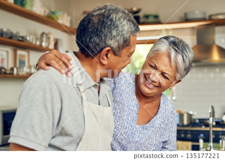 Cooking, hug and old couple in kitchen with smile, healthy marriage bonding in home and helping with dinner. Happiness, help and love, senior man and woman with happy face, meal prep and retirement. 135177221
