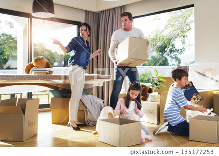 Moving, box and help with family in new house for property, investment and renting. Future, teamwork and real estate with parents and children in living room of home for relocation and homeowner 135177253