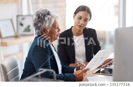Mentoring, teaching or business women with documents talking, speaking or planning project in office. Paperwork, teamwork collaboration or senior manager reading with intern worker for admin coaching Mentoring, teaching or business women with documents talking, speaking or planning project in office. Paperwork, teamwork collaboration or senior manager reading with intern worker for admin coaching 135177316