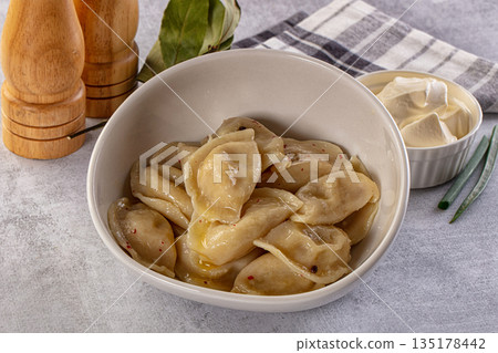 Traditiolal vareniki - stuffed dumplings with potato 135178442
