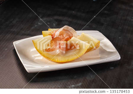 Slised sweet melon with Jamon Slised sweet melon with Jamon 135178453