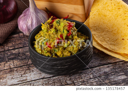 Green spicy Mexican guacamole dip Green spicy Mexican guacamole dip 135178457