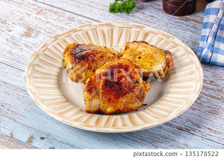 Roasted chicken thighs with spices Roasted chicken thighs with spices 135178522