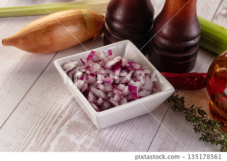 Diced red onion in the bowl 135178561