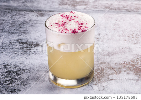 Cocktail Whiskey sour in the glass Cocktail Whiskey sour in the glass 135178695