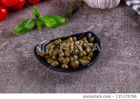Canned marinated capers buds heap Canned marinated capers buds heap 135178766
