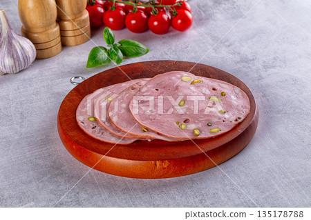Italian mortadella pork sausages slices 135178788