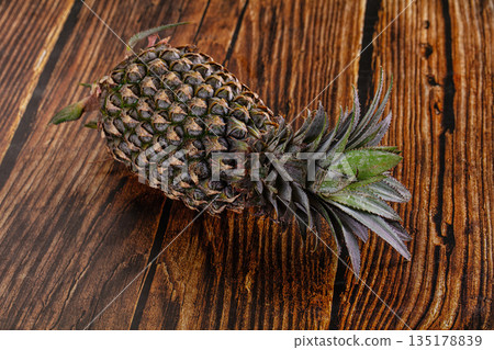 Fresh sweet juicy whole pineapple 135178839