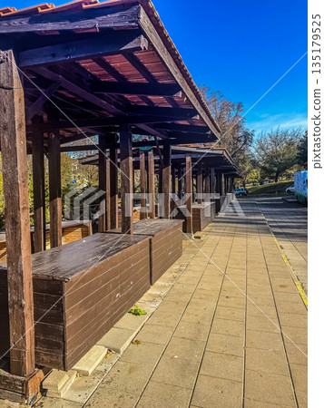 Row of Empty Wooden Market Booths Row of Empty Wooden Market Booths 135179525