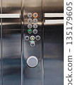 Close-up of Modern Elevator Control Panel with Illuminated Floor Buttons 135179605