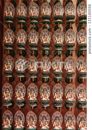 Buddha Tooth Relic Temple in Chinatown, Singapore with intricate wall sculptures and vibrant colors Buddha Tooth Relic Temple in Chinatown, Singapore with intricate wall sculptures and vibrant colors 135180098