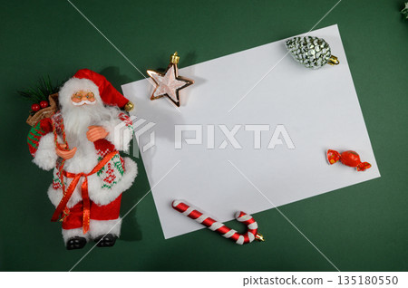 Ded Moroz Figure and Christmas Ornaments on Empty Paper Sheet Ded Moroz Figure and Christmas Ornaments on Empty Paper Sheet 135180550