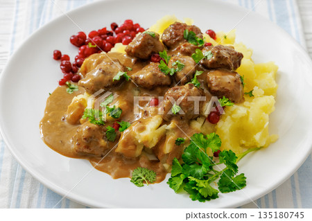 Swedish meatballs with mashed potatoes and gravy 135180745