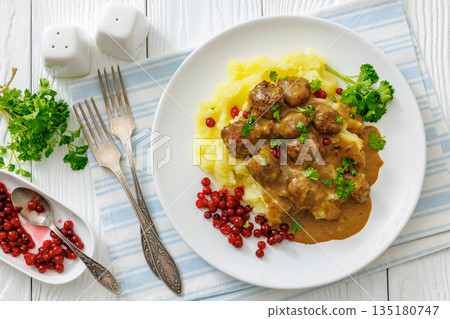 Swedish meatballs with mashed potatoes and gravy Swedish meatballs with mashed potatoes and gravy 135180747