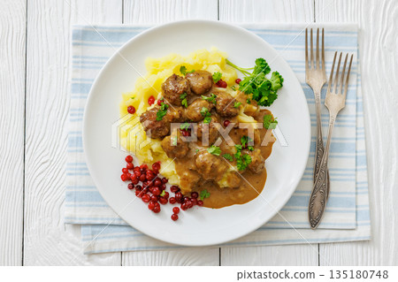 Swedish meatballs with mashed potatoes and gravy Swedish meatballs with mashed potatoes and gravy 135180748