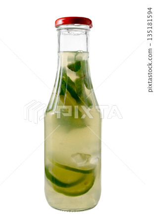 Glass Bottle of Lime Lemonade with Mint and Ice on White 135181594