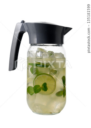 Glass Pitcher of Lime Lemonade with Mint and Ice on White Glass Pitcher of Lime Lemonade with Mint and Ice on White 135181599