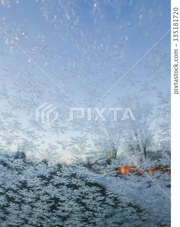 Frost Crystals On Window With Winter View 135181720