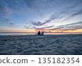 sunrise romantic couple on Corsican coast near Bastia Etang de Biguglia Camping San Daminao Beachside Corse 135182354