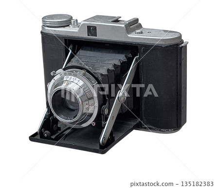 Vintage folding camera creating retro photography memories 135182383