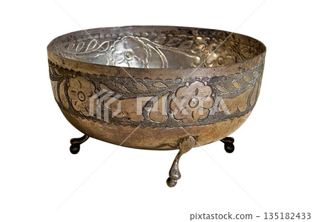 Antique silver metal bowl with embossed floral patterns 135182433
