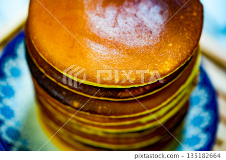 Freshly tasty stack of pancakes on the plate. Delicious homemade breakfast 135182664
