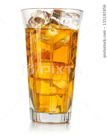 Glass of refreshing iced tea with ice cubes Glass of refreshing iced tea with ice cubes 135182956