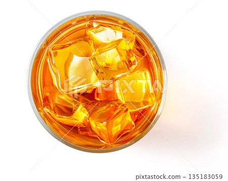 Whiskey drink with ice cubes, top view Whiskey drink with ice cubes, top view 135183059
