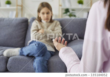 Psychologist meeting sad child with with problems in communication, learning 135184052