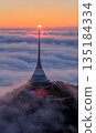 Beautiful Sunset over Famous Mountain Hotel Jested , Aerial Shot Above Clouds 135184334