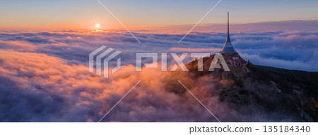 Beautiful Sunset over Famous Mountain Hotel Jested , Aerial Shot Above Clouds 135184340
