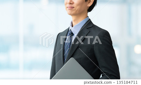 Male businessman with laptop 135184711