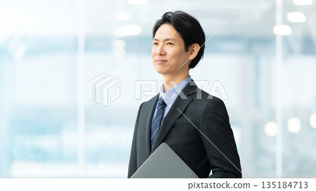 Male businessman with laptop Male businessman with laptop 135184713