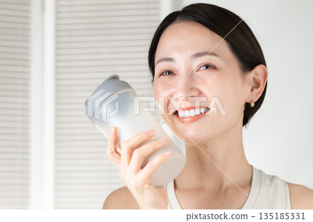 Woman with protein Woman with protein 135185331