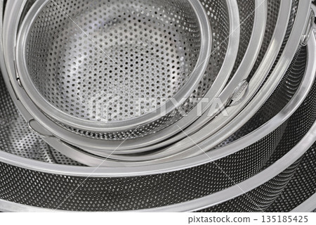 Group of round stainless steel collanders Group of round stainless steel collanders 135185425