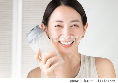 Woman with protein Woman with protein 135185726