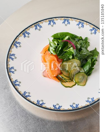 Indulgent evening snack featuring charred crust and seasoned meat 135185840