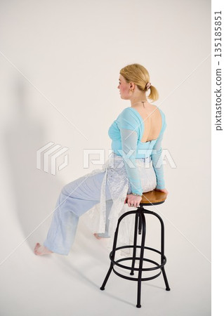 Minimalist image of dancer with peaceful expression and posture Minimalist image of dancer with peaceful expression and posture 135185851