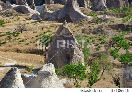 rock formations located near the town of Goreme in Cappadocia 135186606