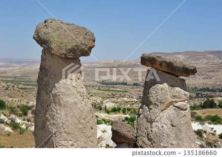 "Three Beauties" are rock formations located near the city of Urgup in Cappadocia "Three Beauties" are rock formations located near the city of Urgup in Cappadocia 135186660