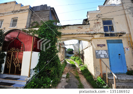 old dilapidated buildings on Cathedral square in Kasimov old dilapidated buildings on Cathedral square in Kasimov 135186932