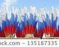festive decoration with Russian flags on Manezhnaya Square in Moscow 135187335