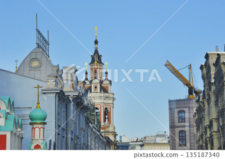view of the Spassky Cathedral and construction crane in Moscow view of the Spassky Cathedral and construction crane in Moscow 135187340