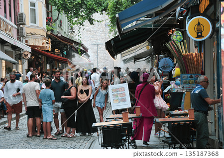 Tourists walking near the Galata Tower in Istanbul 135187368